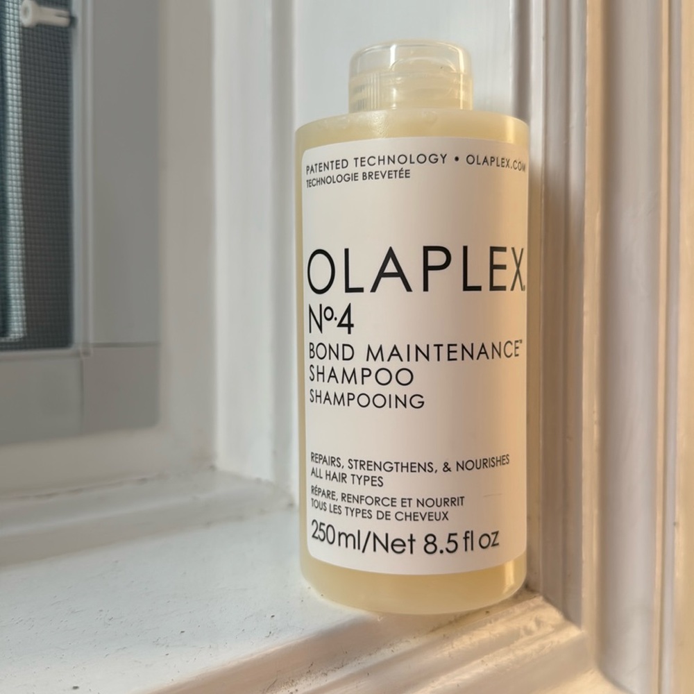 OLAPLEX No.4 Bond Maintenance Shampoo in Cream Bottle